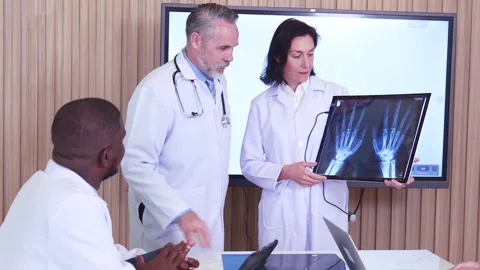 Doctor looking at x ray Stock Footage 245076949