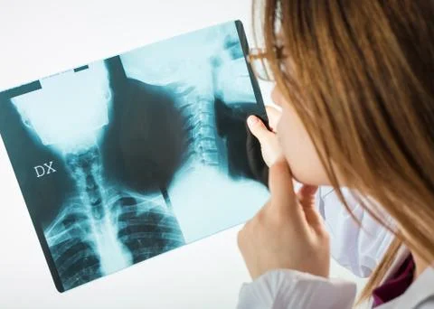 Doctor looking X-rays Stock Photos