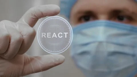 Doctor looks at hologram with React Video stock 130790720