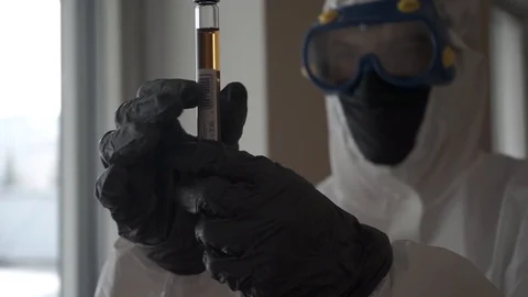 The doctor looks at the test Stock Footage 127751827