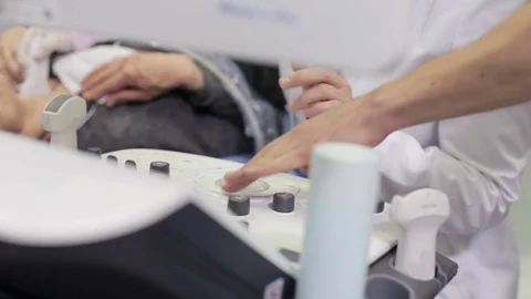 The Doctor Makes Uzi to the Patient Stock Footage