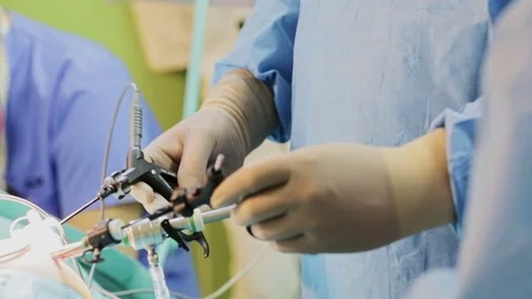 Doctor making endoscopic surgery operation Stock Footage 70353157