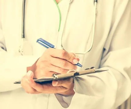 Doctor making notes Foto stock