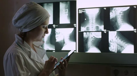 Doctor Making Notes in Tablet PC Stock Footage 50063812