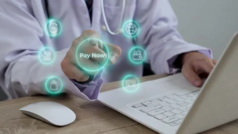 Doctor making successful online payment on laptop using virtual pay now button Stock Footage 346771591
