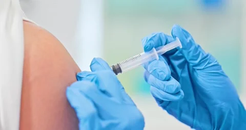 Doctor making a vaccination Stock Footage 144246482