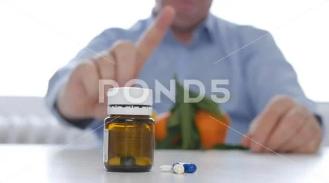 Doctor Making a Warning Hand Sign for Medication Abuse Agreeing Fruits Consume Stock Photos