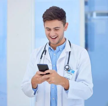 Doctor, man and phone with smile for texting, communication or chatting and good Stock Photos