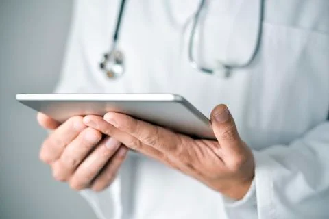 Doctor man using a tablet computer Foto stock