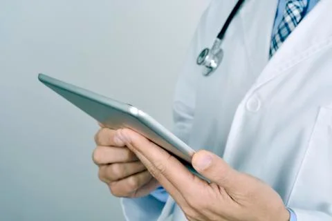 Doctor man using a tablet computer Foto stock