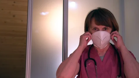 Doctor in mask Stock Footage 127798434