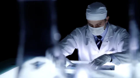 Doctor in a Medical laboratory Examining X rays Stock Footage