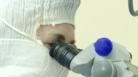 Doctor with a microscope Stock Footage 103188598