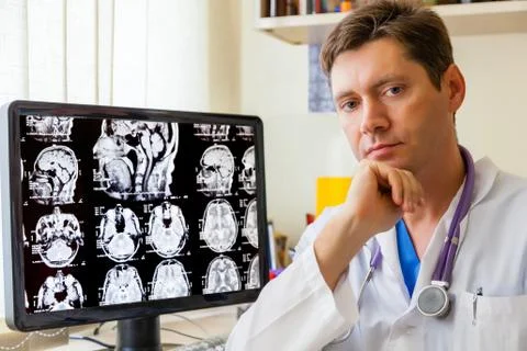 Doctor with an mri scan of the brain Stock Photos