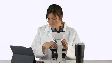 Doctor, Nurse, lab tech with microscope Stock Photos