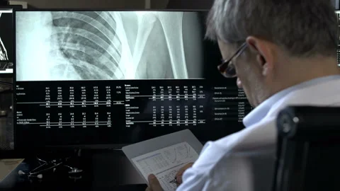 Doctor in office Stock Footage 210454386