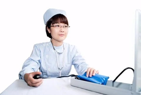The doctor in the operating device Stock Photos