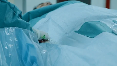 The doctor is operating in the operating room Video stock 125648615