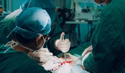 The doctor is operating in the operating room Stock Footage 125653142