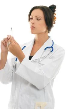 Doctor or nurse with medical syringe Stock Photos