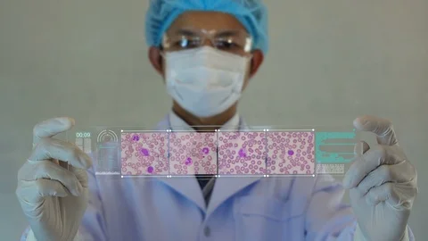 Doctor or Scientist looking a normal blood cells on medicine background. Stock Footage 102693356