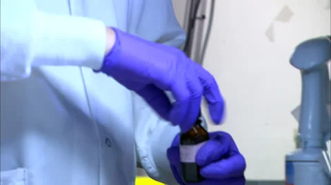 Doctor Performing DNA Test Sequence HD Video Stock Footage 22774764