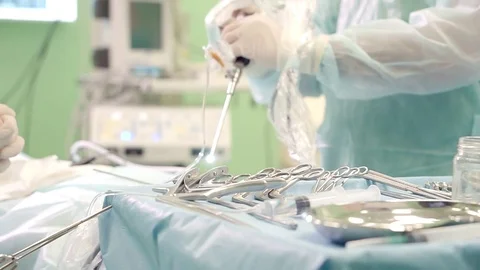 Doctor performs endoscopic surgery removing a brain tumor Stock-Footage 69913181