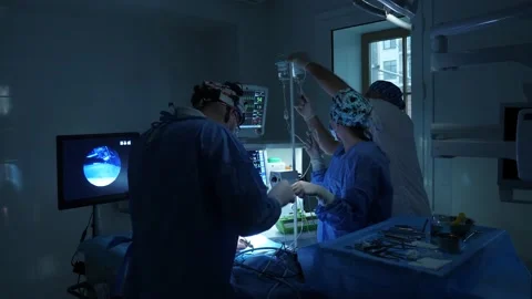 The doctor performs an operation on a child Stock Footage 156304360