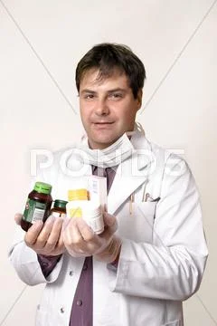 Doctor pharmacist with medications Stock Photos