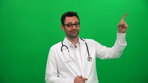 Doctor Pointing Finger Up to Left Corner Stock Footage 88652217