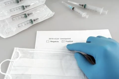 Doctor points to positive test for new rapidly spreading coronavirus 2019-nCO Stock Photos