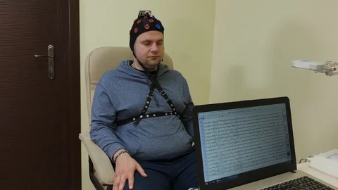 Doctor prepares headset for human brain research. Stock-Footage 116350435