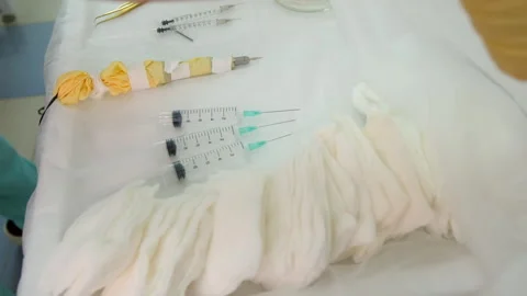 Doctor preparing operating room for surgeon operation in hospital opening tools. Stock Footage 311877357