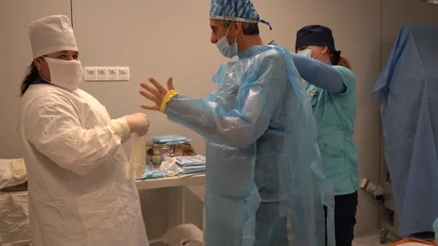 Doctor preparing for surgery Stock Footage 194357797