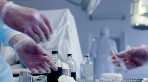 Doctor Preparing Syringe for Injection Stock Footage 59059234