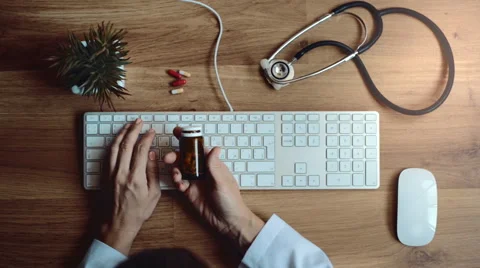 Doctor prescribing receipt at the table Video stock 65326826