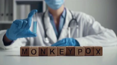 Doctor in a protective mask, a collage on the theme of monkeypox pandemic. I 動画素材 196978980