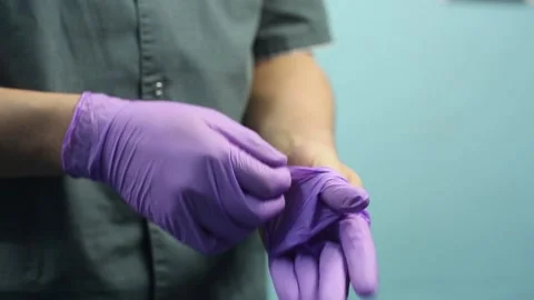 Doctor Put On A Disposable Gloves Stock Footage 86240949