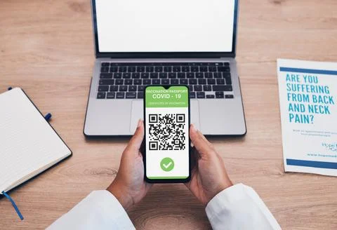 Doctor, qr code and hands with phone for with covid results and information with Stock Photos