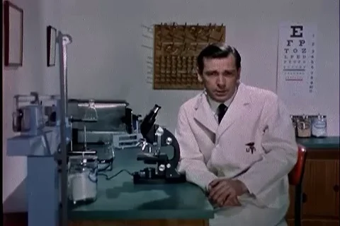 Doctor refers the difference between impotency and sterile - 1960 Stock Footage 102852674