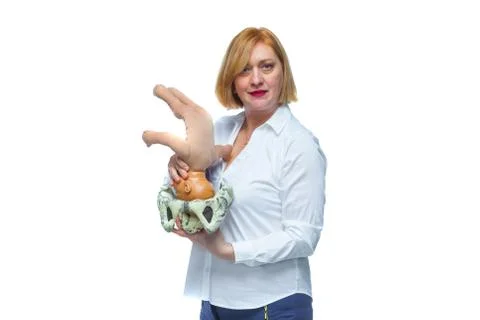 The doctor schematically on the layout shows the process of passing the child Stock Photos