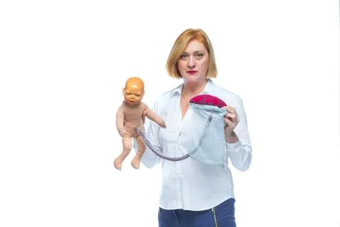 The doctor schematically on the layout shows the process of passing the child Stock Photos