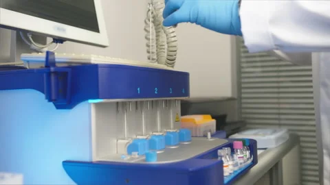 Doctor Scientist Using Micro Pipette for Analysis. Working in Advanced Stock Footage 204771861