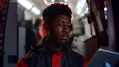 Doctor scrolling touchscreen on tablet computer. Man using digital gadget Stock Footage 166883087