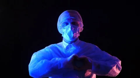 Doctor sends heart to camera. Stock Footage 127063004