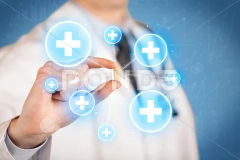 A doctor showing a pill with crosses Stock Photos