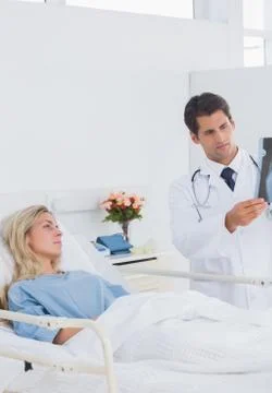 Doctor showing xray Stock Photos