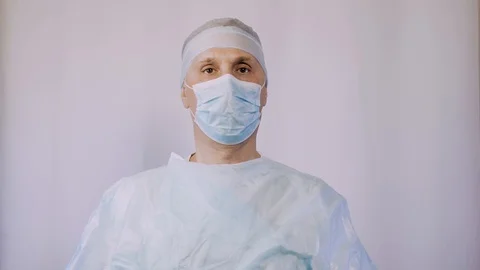 A doctor shows the tablets in the package that need to take to a patient after Stock Footage 98291696