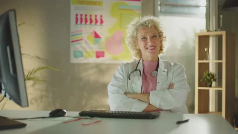 Doctor smiling while looking at camera Video stock 221266048