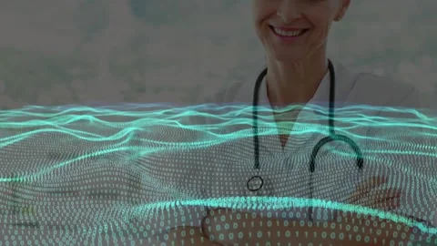 Doctor standing arms crossed, binary wave rippling revealing stethoscope, Stock Footage 332281571